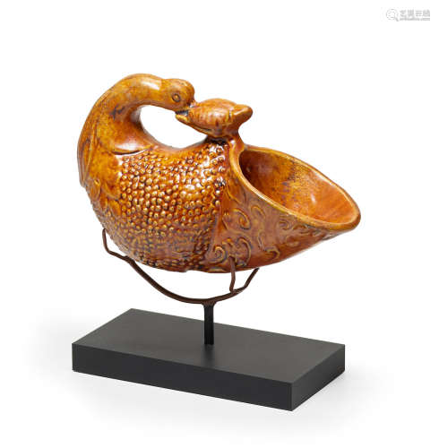 Tang dynasty AN AMBER-GLAZED POTTERY GOOSE-HEAD RHYTON