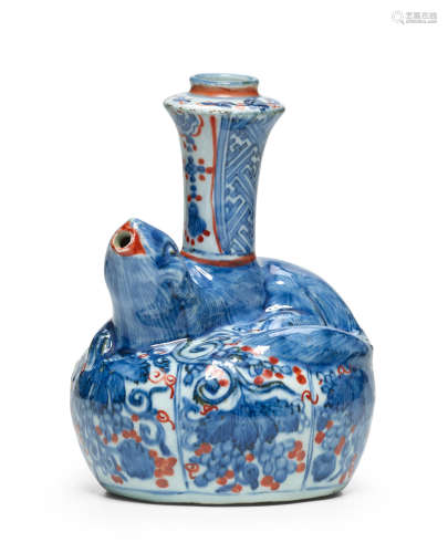 Ming dynasty, Wanli period A rare squirrel-form underglaze blue and iron-red porcelain kendi