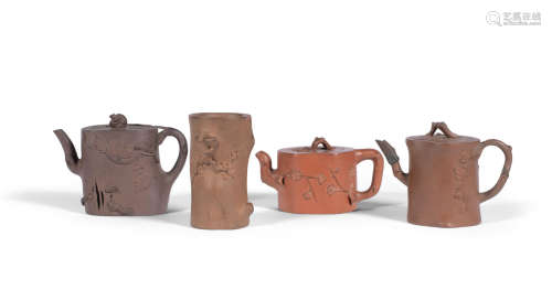 Early Qing Dynasty and later A group of four Yixing stoneware tree-trunk form vessels