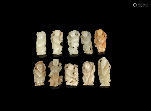Qing Dynasty A group of green jade figural carvings