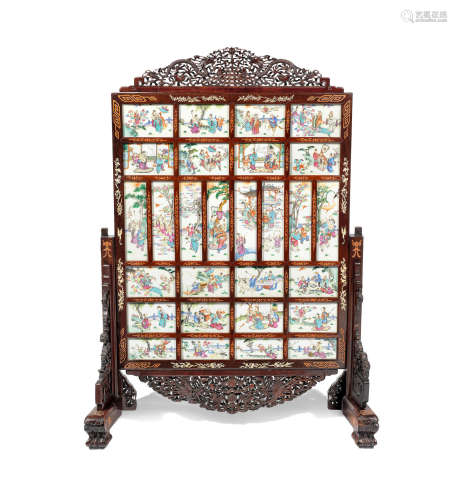 The porcelain 18th/19th century, the stand later A famille rose porcelain-inset hongmu screen