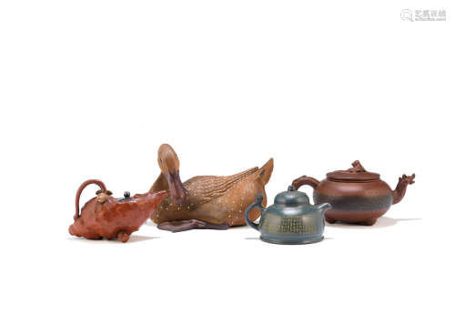 Qing Dynasty and later An assorted group of Yixing teapots and ewers