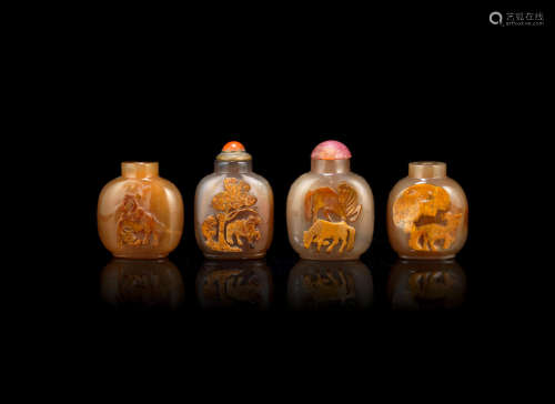 Late Qing Dynasty Four 'cameo' agate snuff bottles