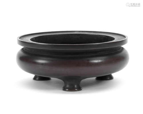 Xuande six-character mark, Qing Dynasty A bronze tripod incense burner