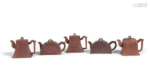 19th/20th century A selection of five Yixing 'calligraphy' teapots and covers