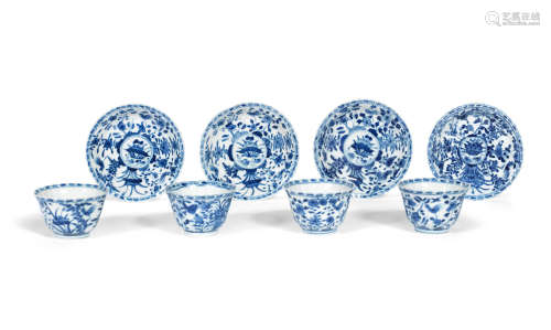 Kangxi A set of four blue and white 'cockerel' teabowls and saucers