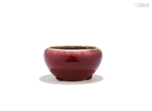 19th century A flambé-glazed tripod bowl