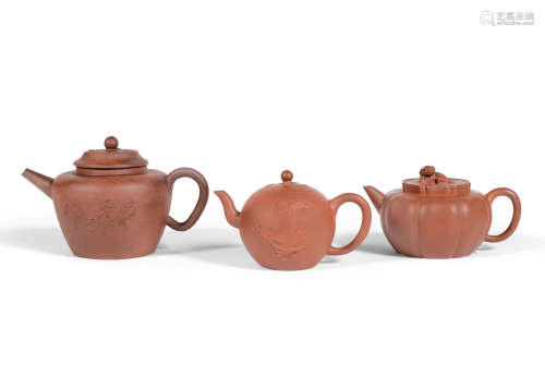Republic period and earlier Three Yixing red stoneware teapots and covers