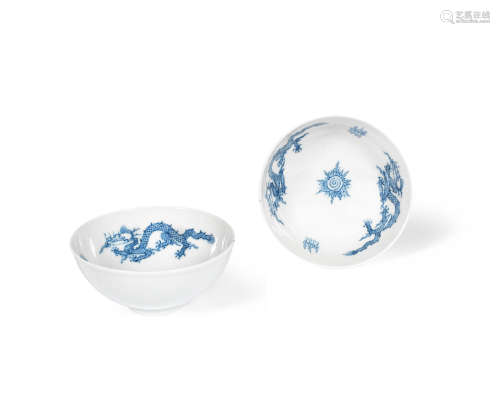 Jiaqing seal marks and of the period A pair of blue and white 'dragon' cups