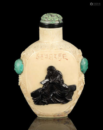 Late 19th/Early 20th century A carved ivory snuff bottle inlaid with jet and turquoise