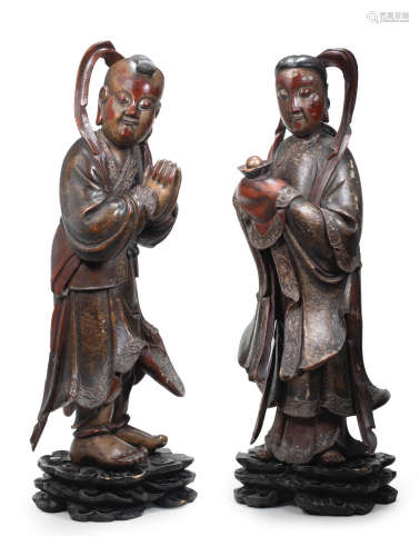 19th century A pair of large lacquered wood figures of Shancai and Longnü