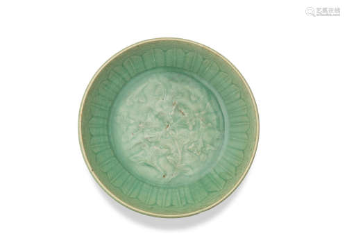 Ming Dynasty A celadon-glazed moulded 'lotus' dish
