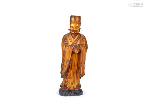 Late Ming Dynasty A gilt-wood figure of a court official