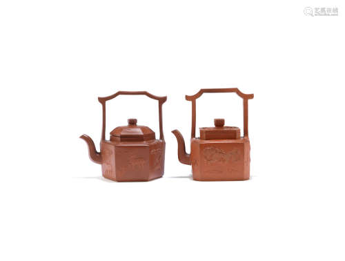Early Qing Dynasty Two Yixing teapots and covers with overhead handles and applied decoration