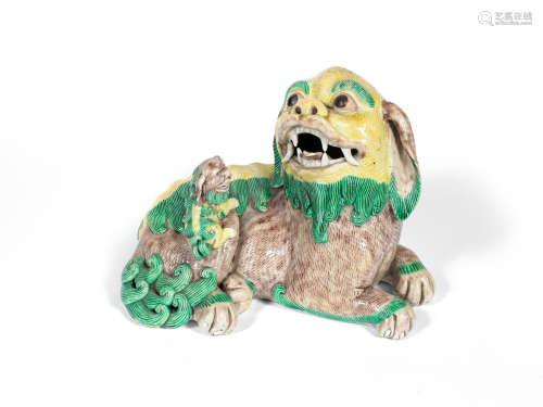 19th Century A famille verte biscuit model of a Buddhist lion
