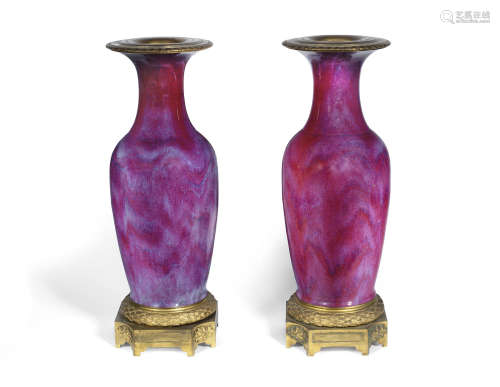18th/19th century A PAIR OF ORMOLU-MOUNTED FLAMBÉ-GLAZED BALUSTER VASES