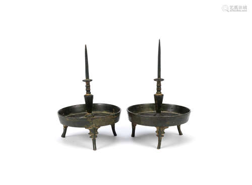 Han Dynasty or later A pair of bronze pricket candlesticks