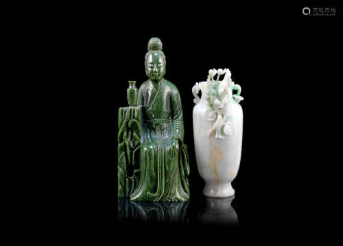 19th or 20th century  A spinach green jade figure of Guanyin