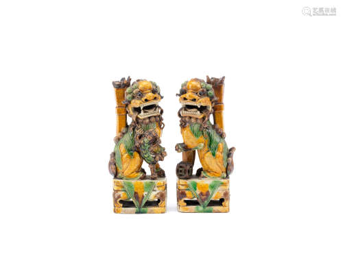 Kangxi A pair of sancai-glazed Buddhist lion-shaped incense holders