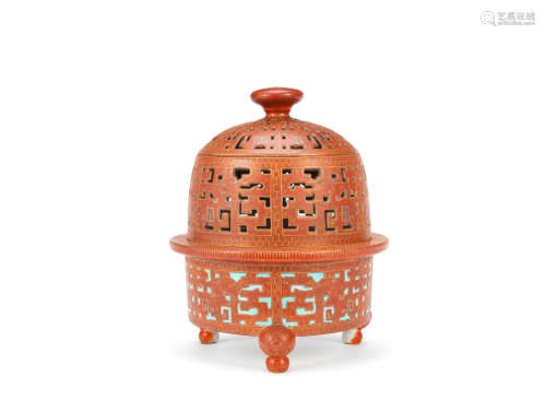 Qianlong seal mark, 20th century A coral-ground gilt-decorated tripod brazier