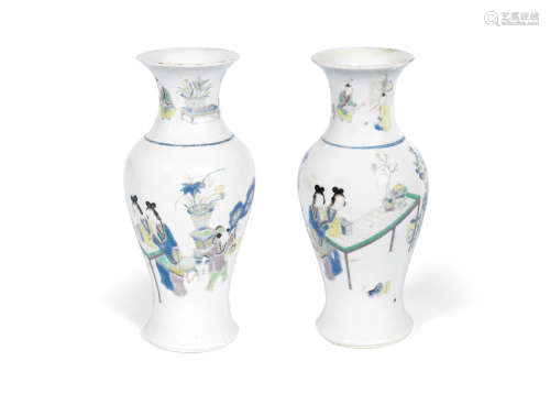 Kangxi six-character marks, 19th century A pair of famille verte baluster vases