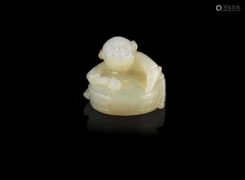 Late Qing Dynasty A small pale green jade figure of a drummer boy