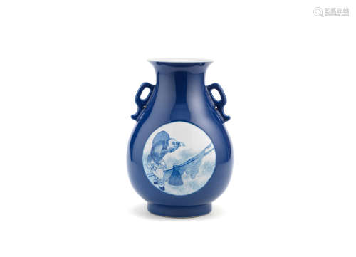 Yongzheng seal mark, 20th century A powder-blue ground pear-shaped vase