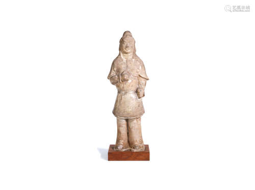 Han Dynasty A straw-glazed pottery figure of a soldier