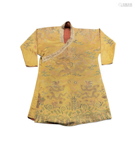 Tibet, 18th century  A gold silk-brocade 'dragon' robe, chuba