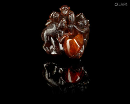 Qing Dynasty An amber 'monkeys' plaque