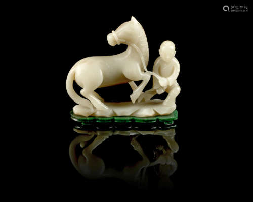 A white jade 'boy and horse' group