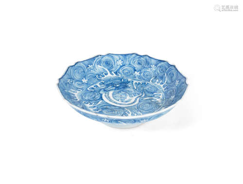 Jiajing six-character mark, 17th century A blue and white 'fish dragon' dish