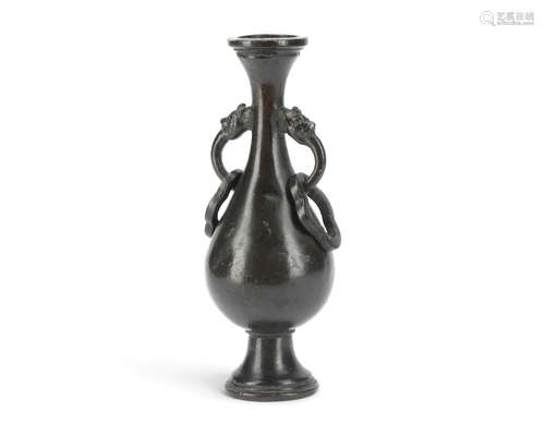 14th/15th century A small bronze baluster vase