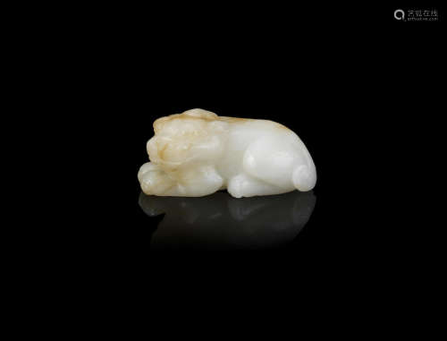 A white and russet jade carving of a mythical beast