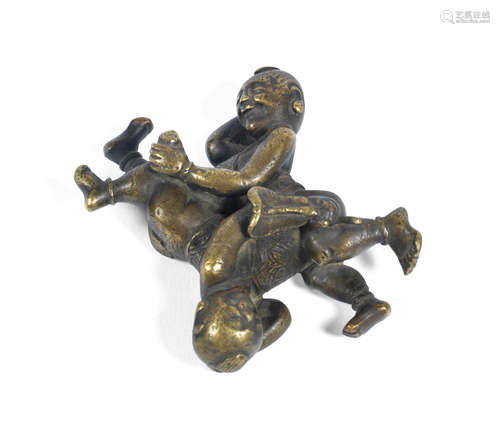 19th century A bronze 'four happy boys' scroll weight