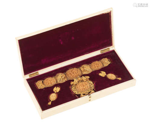 Lee Ching marks, 19th century A gold filigree and hornbill bracelet, brooch and earrings in the original carved ivory box