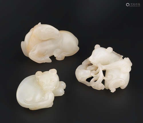 18th/19th century Three white and very pale green jade carvings of animals