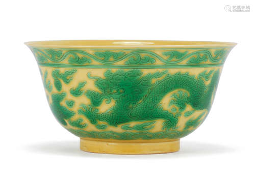 Kangxi six-character mark and of the period A yellow and green-enamelled 'dragon' bowl