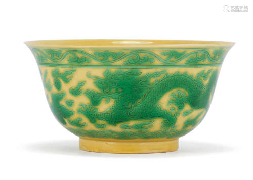 Kangxi six-character mark and of the period A yellow and green-enamelled 'dragon' bowl