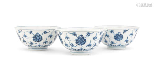 Chenghua six-character marks, Kangxi Three blue and white 'lotus scroll' bowls