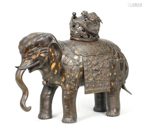 Mid-Qing Dynasty A large gold-splashed bronze 'elephant' incense burner and cover