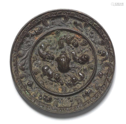 Tang Dynasty A bronze 'lion and grapveine' mirror