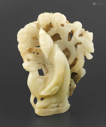 12th/13th century A rare pale green and russet jade carving of Shoulao, deer and crane