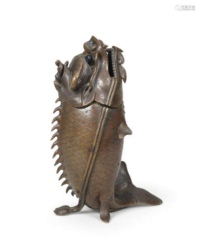 Qing Dynasty An unusual bronze 'dragon-fish' incense burner and cover