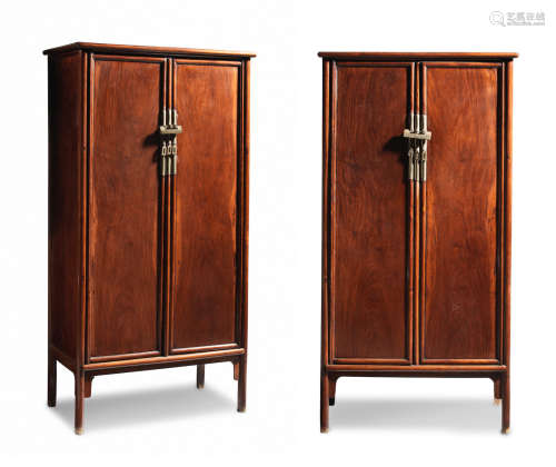 Ming Dynasty, 16th/17th century An important and exceedingly rare pair of large huanghuali tapering cabinets, yuanjiaogui