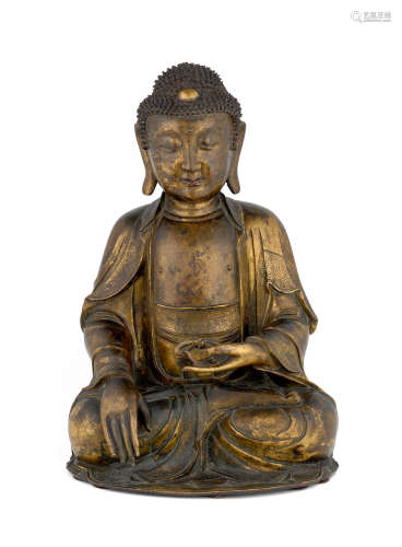 17th century A large gilt-bronze figure of Buddha Shakyamuni