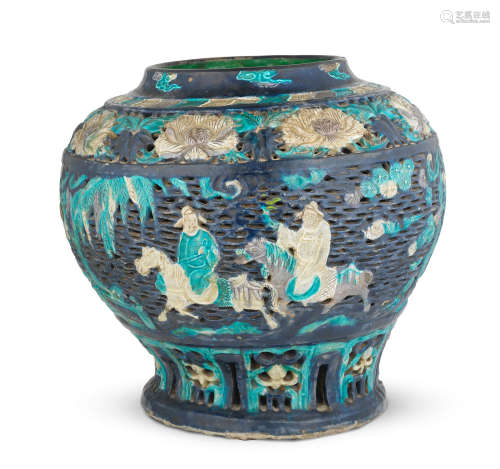 16th century A large reticulated fahua jar, Guan