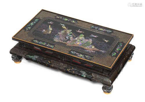 17th/18th century A very fine mother-of-pearl-inlaid black lacquer 'Immortals' low table, kang
