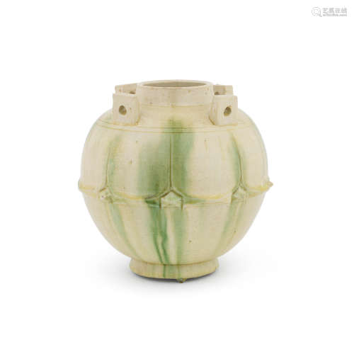 Tang Dynasty A green-glazed 'lotus-petal' jar, guan