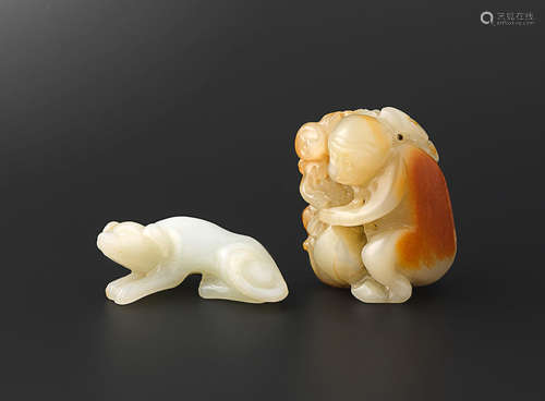 19th century A pale green and russet jade 'monkey' group